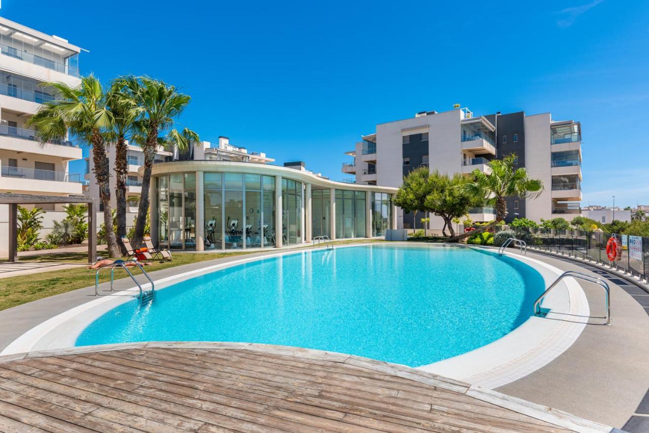 Апартаменты La Zenia Cocoon - Luxury Penthouse With Jacuzzi, 2 Pools, Indoor Heated Pool, Sauna, Gym, Playstation Dehesa de Campoamor  Экстерьер фото