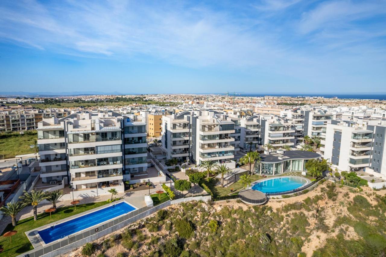 Апартаменты La Zenia Cocoon - Luxury Penthouse With Jacuzzi, 2 Pools, Indoor Heated Pool, Sauna, Gym, Playstation Dehesa de Campoamor  Экстерьер фото